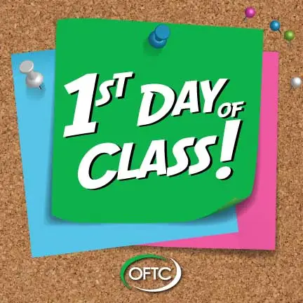 A green sticky note pinned to a corkboard reads 1st Day of Class! in bold white letters, with blue and pink notes behind it and the OFTC logo at the bottom.