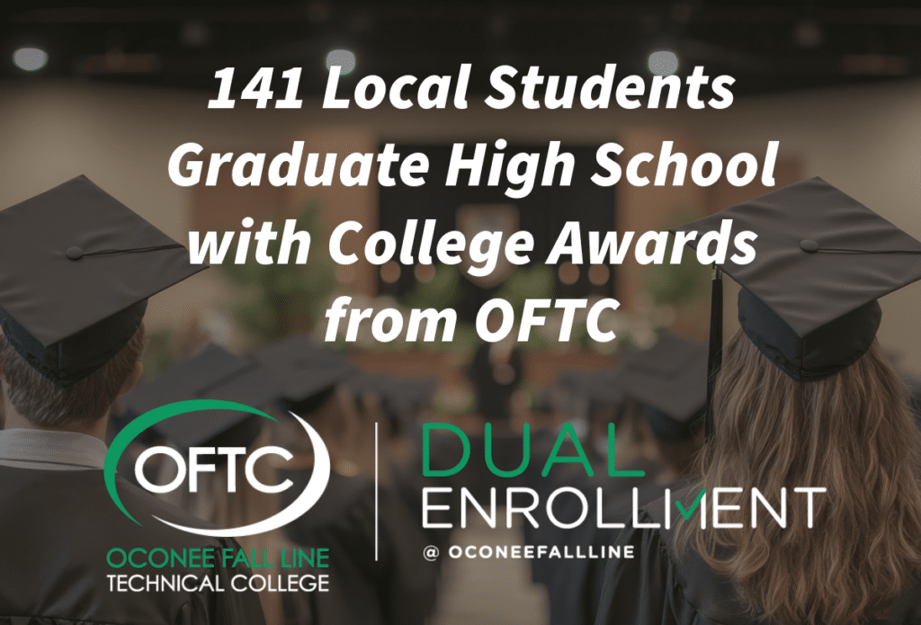 A group of graduates in caps and gowns sit facing a stage, with text overlay: 141 Local Students Graduate High School with College Awards from OFTC and Oconee Fall Line Technical College, Dual Enrollment logos.