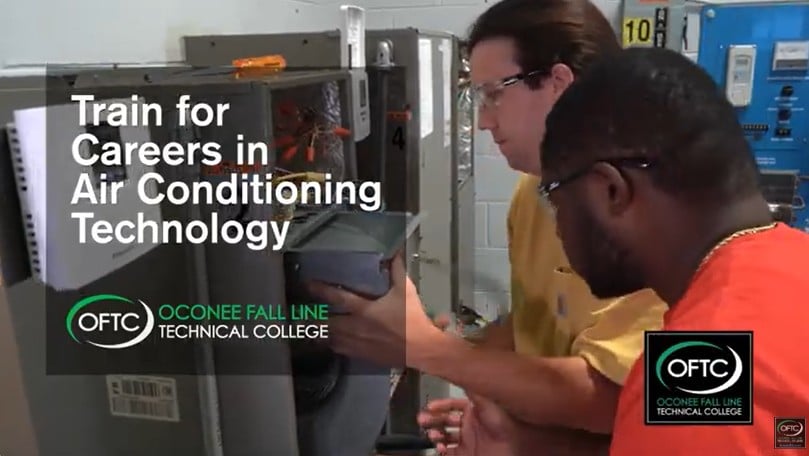 Two men work on an air conditioning unit in a workshop. Text reads, Train for Careers in Air Conditioning Technology. OFTC Oconee Fall Line Technical College, with the college’s logo visible.