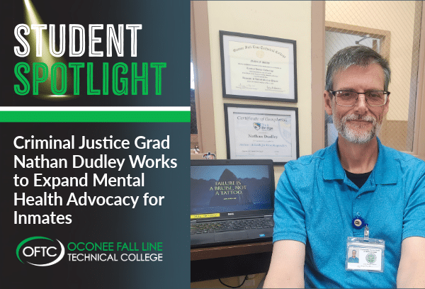A man with glasses and a beard sits at a desk with a laptop. A sign behind him shows certificates. Text highlights Nathan Dudley, a Criminal Justice graduate, working in mental health advocacy for inmates at OFTC.