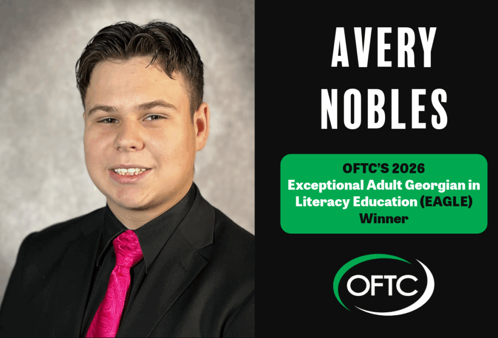 A young man in a suit and bright pink tie smiles in a formal portrait. Text reads: Avery Nobles, OFTC 2026 EAGLE Winner. The OFTC logo appears at the bottom.