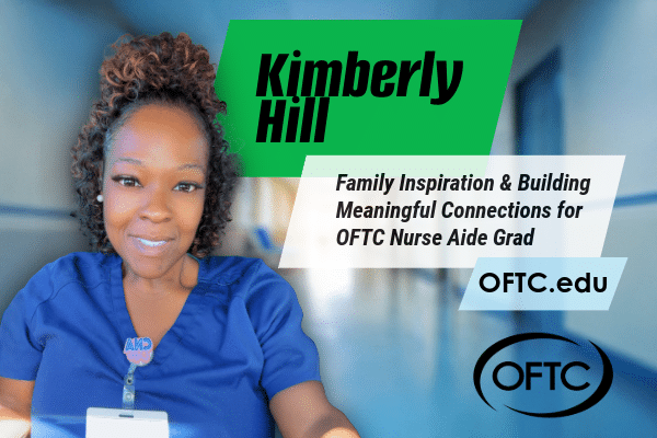 A woman in blue scrubs with a name badge smiles in a hallway. Text: Kimberly Hill: Family Inspiration & Building Meaningful Connections for OFTC Nurse Aide Grad. OFTC.edu. OFTC logo is visible.