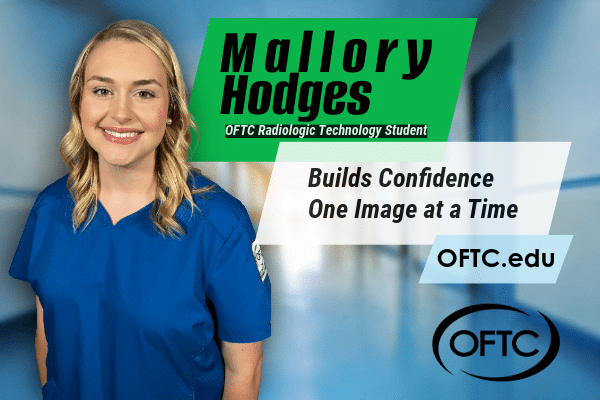 A smiling woman in blue medical scrubs stands in a hallway. Text: Mallory Hodges, OFTC Radiologic Technology Student. Builds Confidence One Image at a Time. OFTC.edu with the OFTC logo at the bottom.