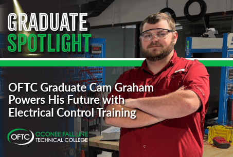 A bearded man in safety glasses and a red shirt stands confidently in a technical lab. Text reads: Graduate Spotlight. OFTC Graduate Cam Graham Powers His Future with Electrical Control Training. OFTC logo is shown.