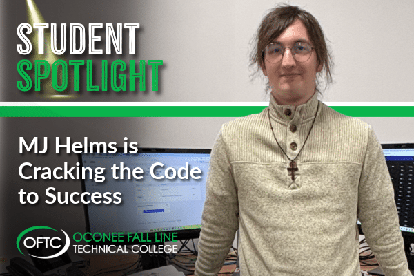 A student with long hair and glasses stands before computer monitors. Text: Student Spotlight, MJ Helms, OFTC Oconee Fall Line Technical College.
